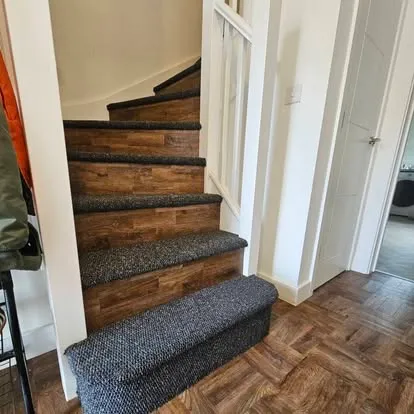 Stairs with carpet treads and wood-effect risers